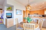 The dining table comfortably sits up to four people